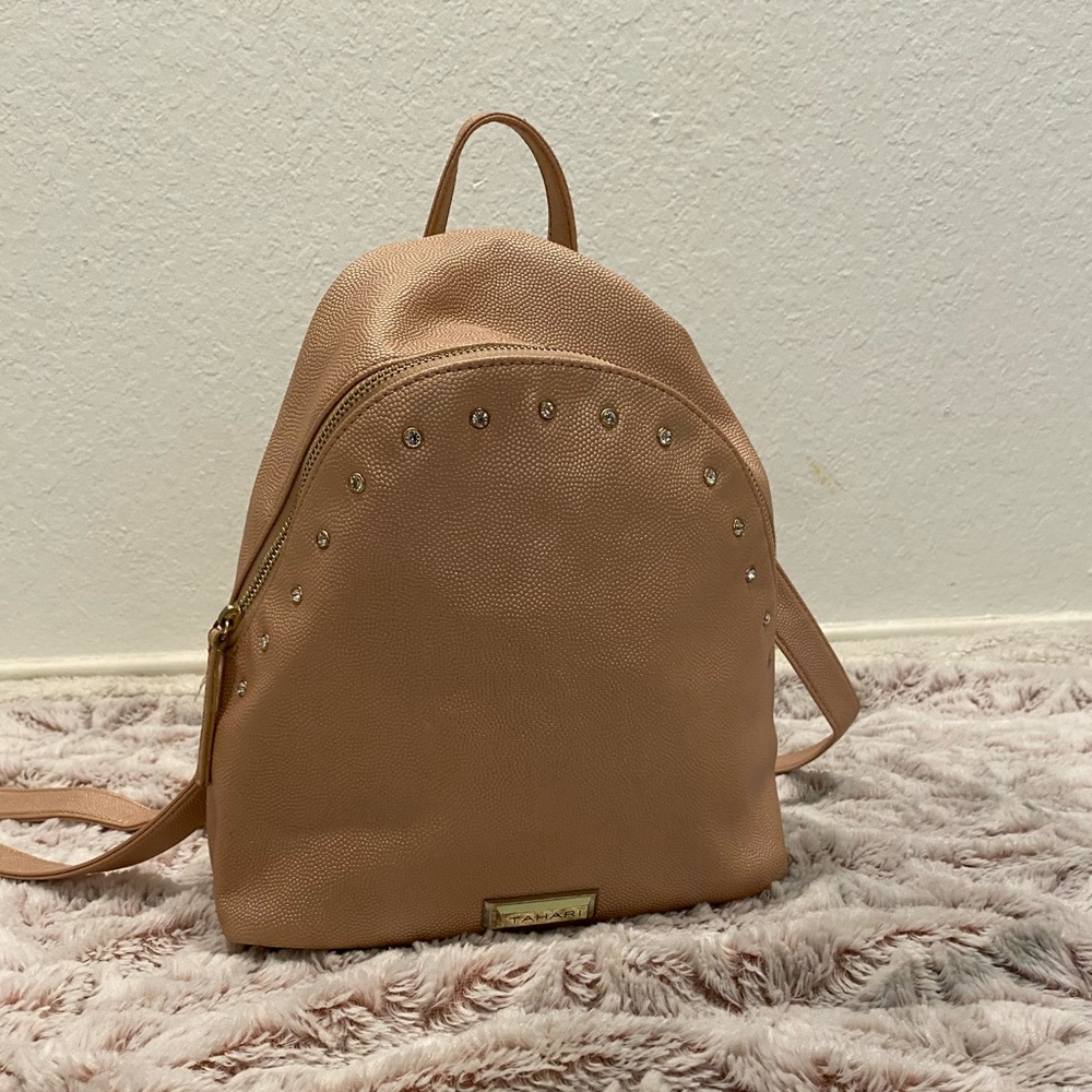 Tahari rose gold metallic backpack  with rhinestones on it
